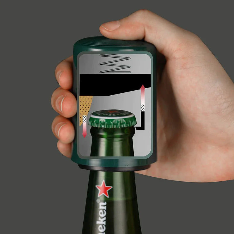 Hand holding a magnetic automatic beer bottle opener showing internal mechanism