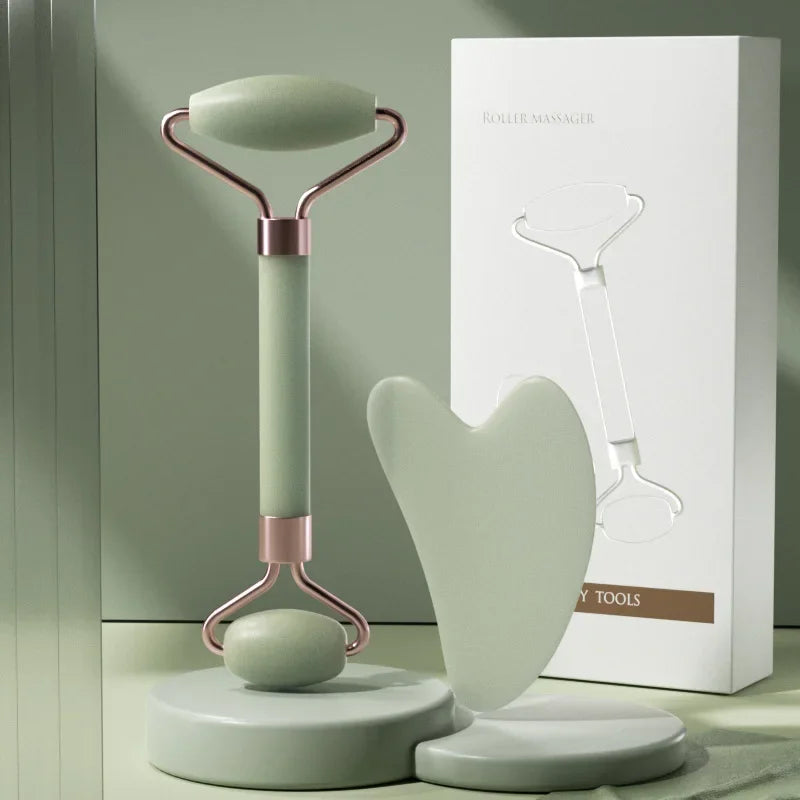 Green jade facial roller with matching gua sha for skincare routine
