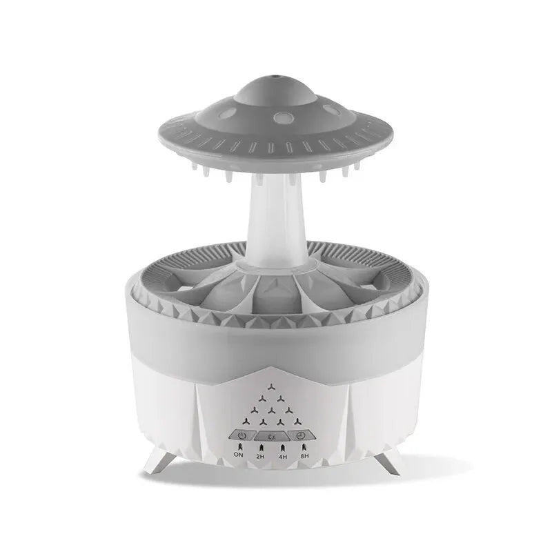 Gray and white UFO-shaped device on a white background