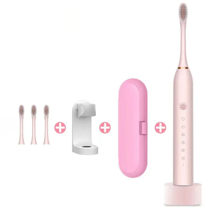 Pink electric toothbrush set with travel case, wall mount, and three replacement heads