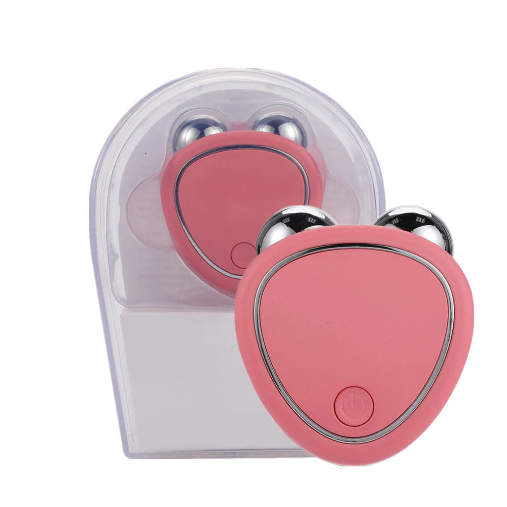 Pink heart-shaped device with metallic accents on a white background