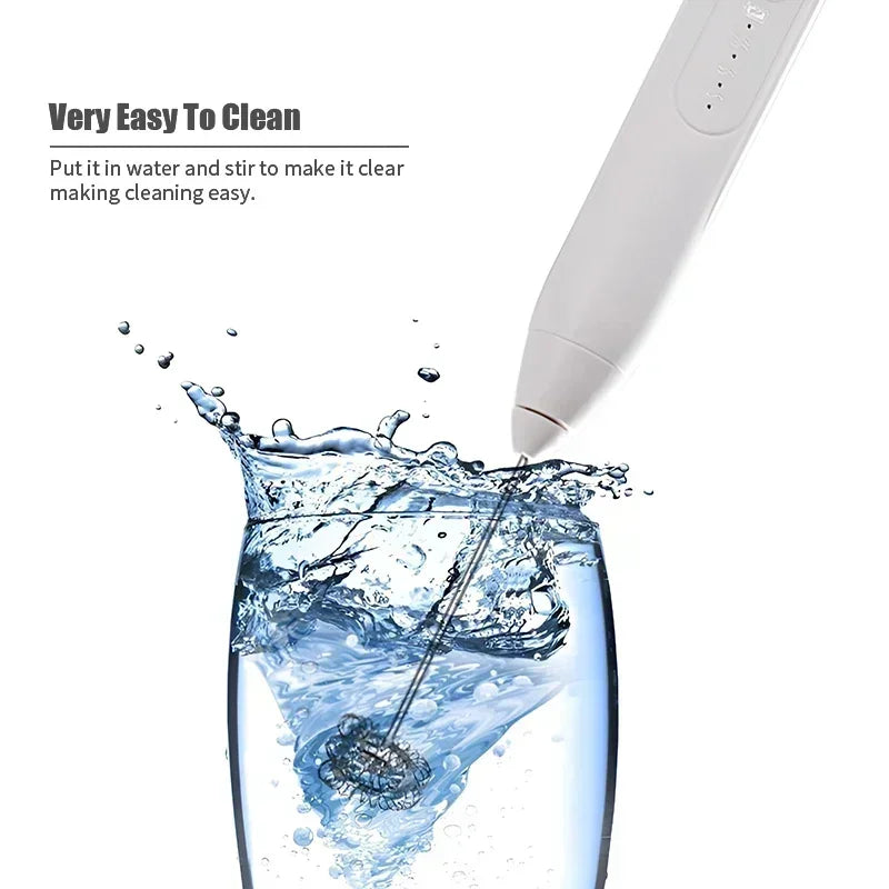 USB rechargeable milk frother being cleaned easily by stirring in water