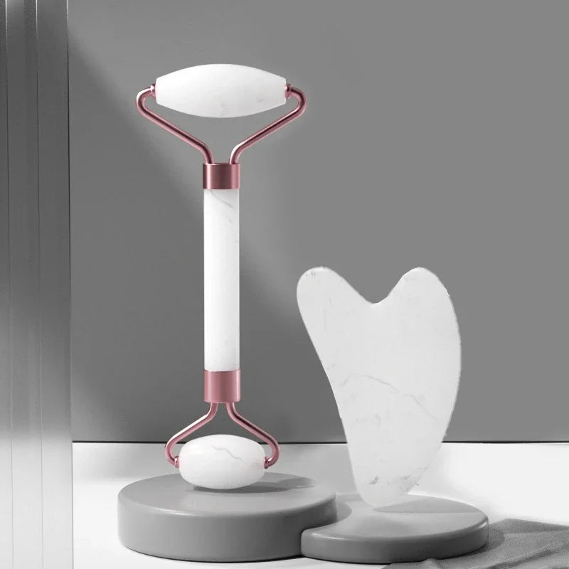 White marble-textured roller and gua sha scraper for face massage