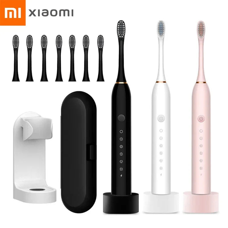 Xiaomi electric toothbrush set in black, white, and pink with multiple heads and accessories