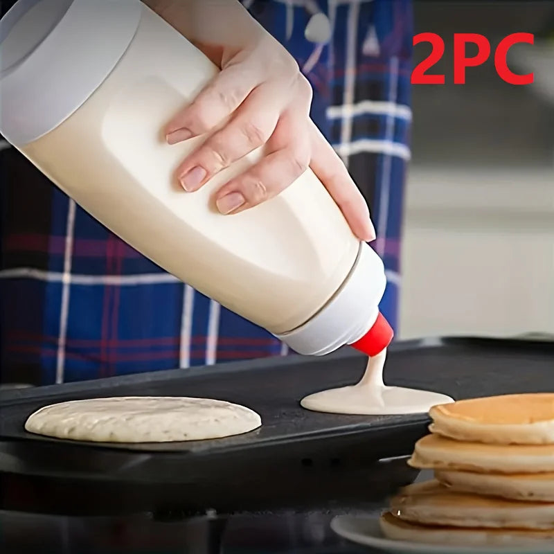 Squeezing pancake batter from dispenser bottle onto griddle - 2 pieces set