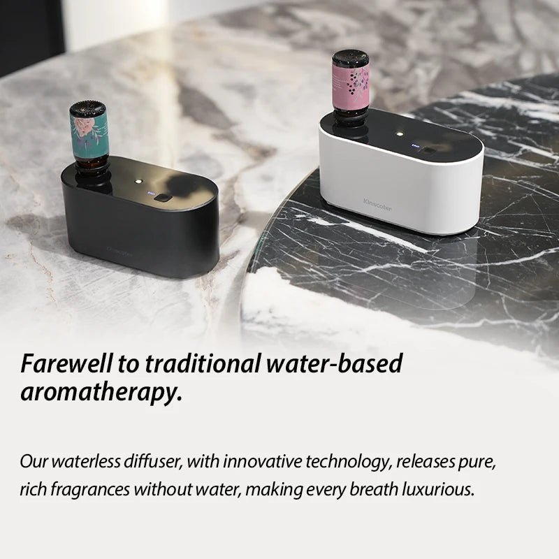 White KINSCOTER waterless aroma diffuser with essential oil bottles, showcasing pure fragrance diffusion without water.