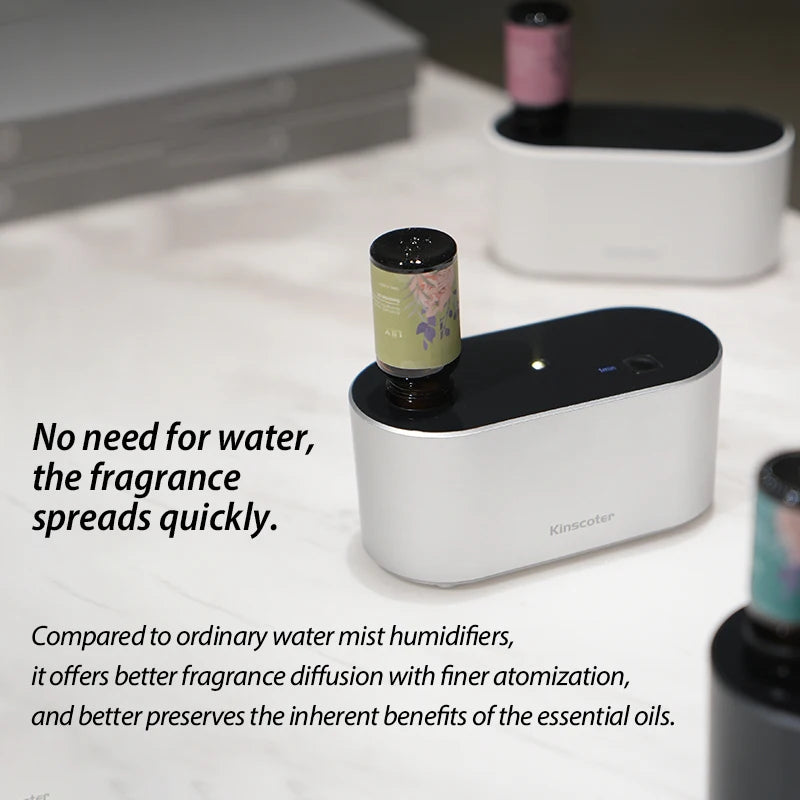 KINSCOTER waterless aroma diffuser with essential oil bottles, showcasing pure fragrance diffusion without water.