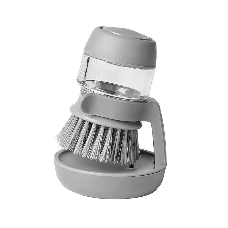 Gray dish brush with clear container on a white background