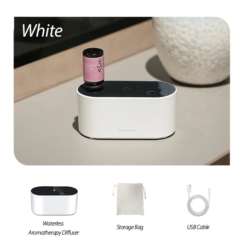White KINSCOTER waterless aroma diffuser with essential oil bottle, storage bag, and USB cable, perfect for portability.