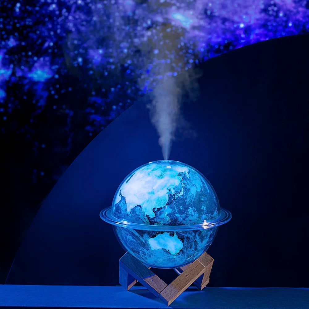 Earth-shaped air humidifier diffuser glowing in the dark with steam mist