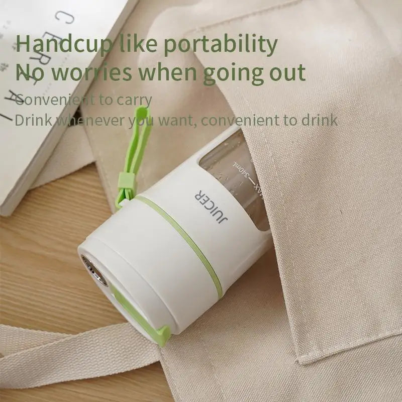 White and green portable water bottle with text on a beige surface