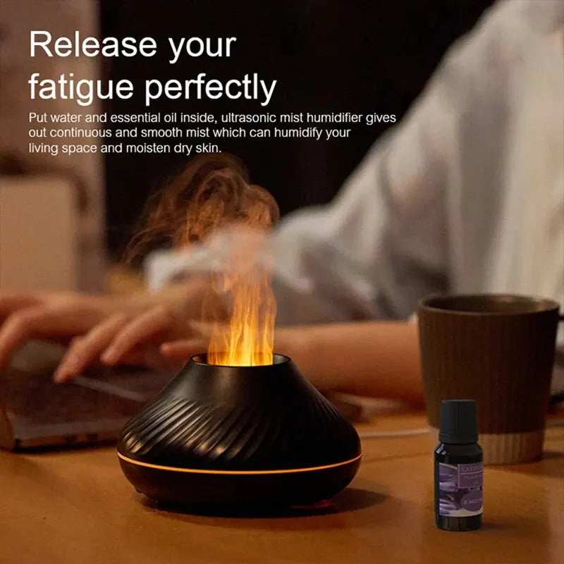 Volcano aroma diffuser on desk emitting realistic flame mist