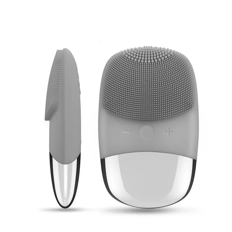 Gray electric facial brush shown from front and side for better view of structure