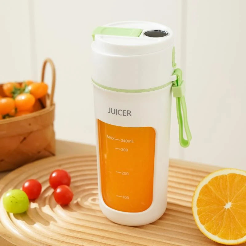 Juicer with orange and white design on a wooden surface with fruits in the background