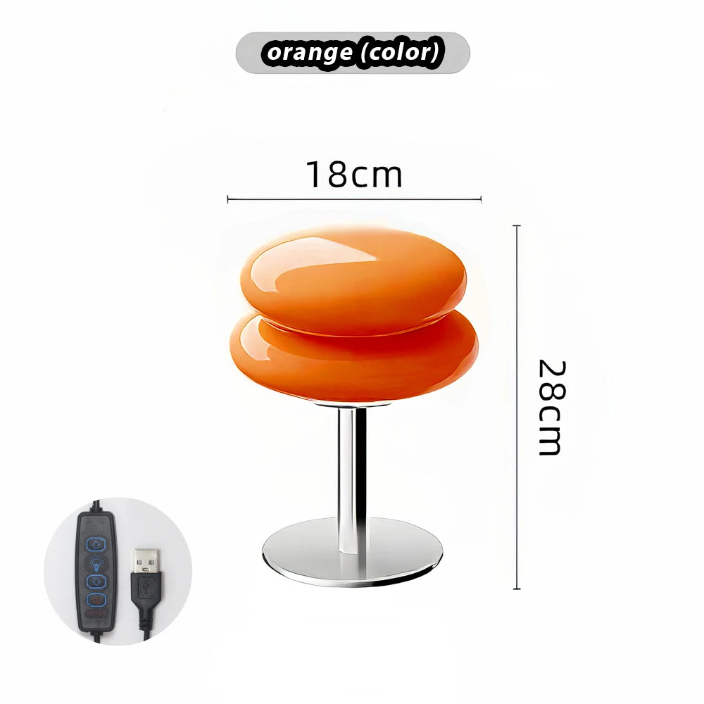 Orange stool with dimensions and a small inset of a control device and USB cable.