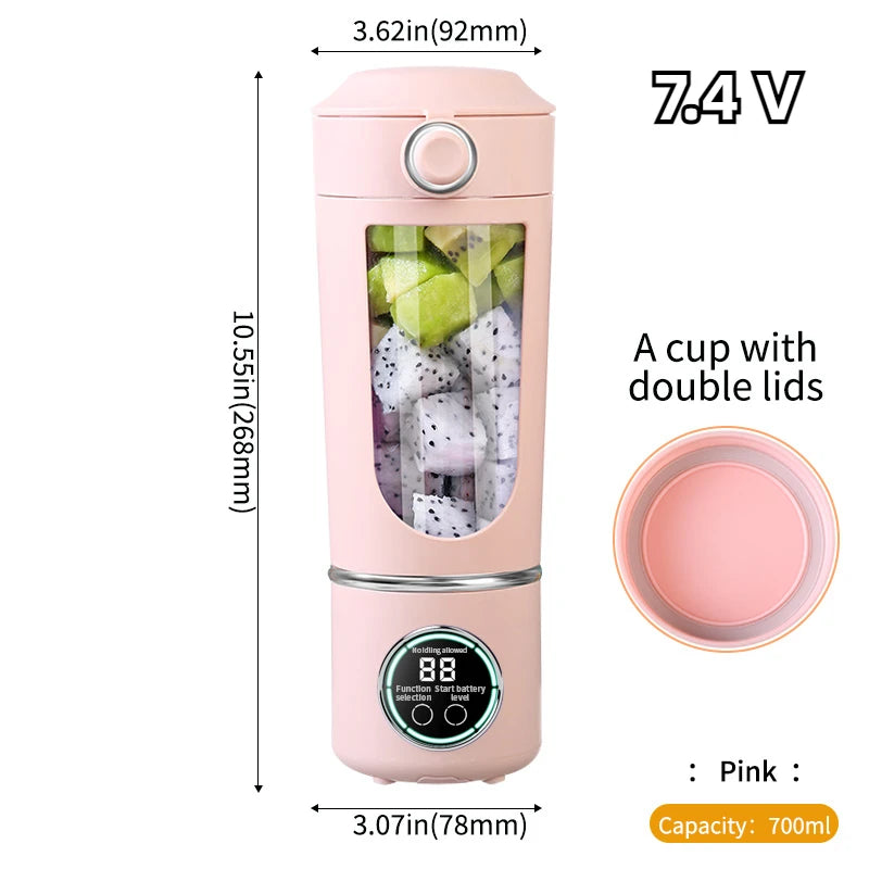 Pink portable blender with measurements and fruit inside on a white background