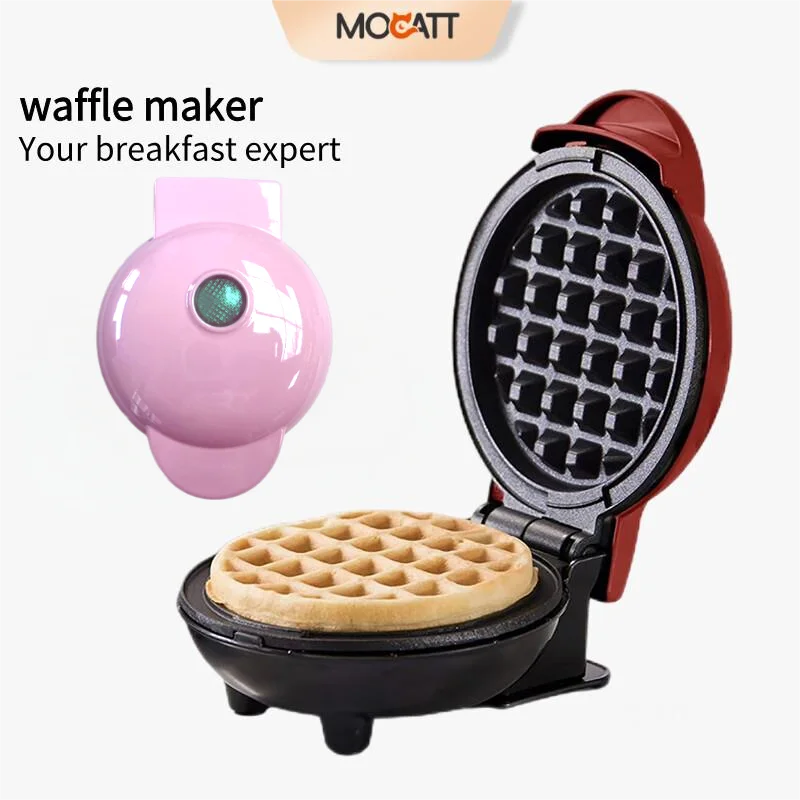 Waffle maker with a waffle inside, branded as Mocatt, on a white background.