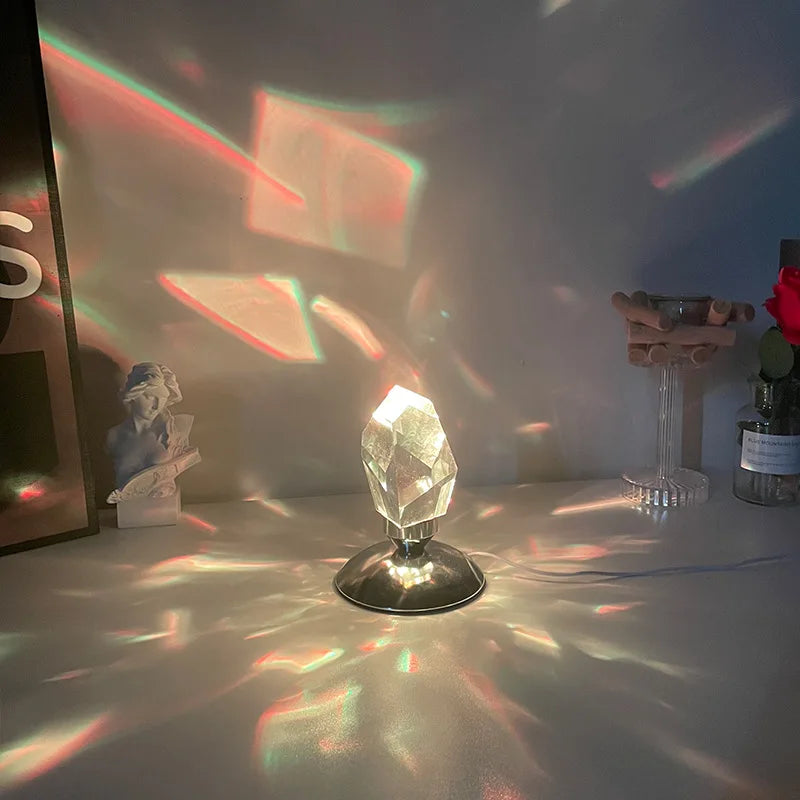 Multicolor ambient projection from crystal lamp on wall and desk