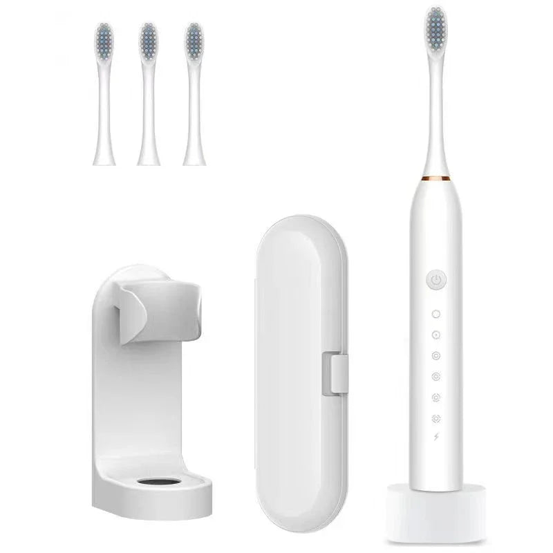 White electric toothbrush set with three replacement heads, travel case, and wall mount